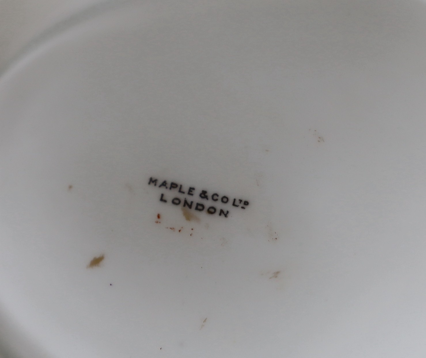A large Maple & Co. dinner service (64 pieces)